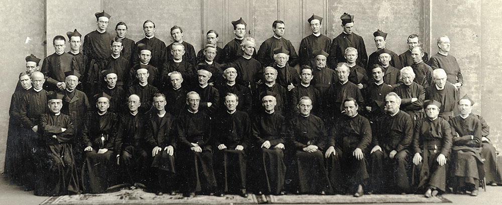 jesuit priests posing for a picture 